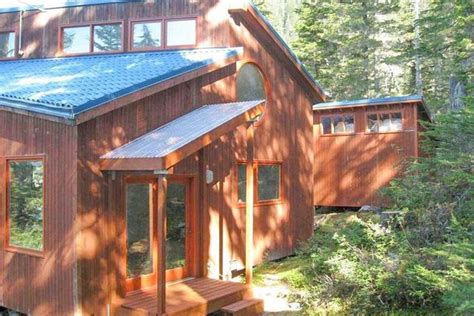 The home has multiple small cabins. . Alaska cabins for sale